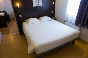 Postel nebo postele na pokoji v ubytování Cottage Logis Hôtel - Restaurant