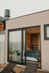 Postel nebo postele na pokoji v ubytování Casas na montanha - Villa Montegrappa