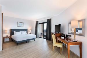 Krevet ili kreveti u jedinici u okviru objekta Radisson Blu Resort, Malta St. Julian's