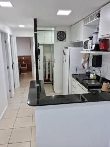 Una cocina o zona de cocina en Marina Bezerril - 1102 Ahead - O melhor de Natal