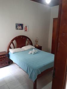 Postel nebo postele na pokoji v ubytování Casa de Lençóis