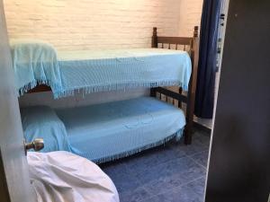Двухъярусная кровать или двухъярусные кровати в номере Complejo 421