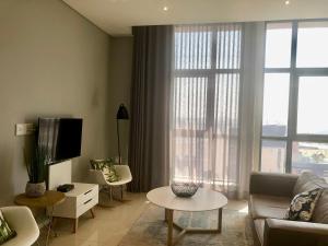 Zona d'estar a Urban Awe Apartment: iTowers 21st Floor