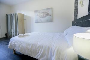 Posteľ alebo postele v izbe v ubytovaní Le 34 Malon, T5 hypercentre chic et cosy, wifi, netflix par SOVALFI
