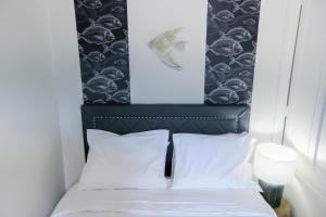 Posteľ alebo postele v izbe v ubytovaní Le 34 Malon, T5 hypercentre chic et cosy, wifi, netflix par SOVALFI
