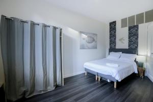 Posteľ alebo postele v izbe v ubytovaní Le 34 Malon, T5 hypercentre chic et cosy, wifi, netflix par SOVALFI