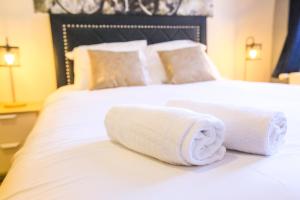Posteľ alebo postele v izbe v ubytovaní Le 34 Malon, T5 hypercentre chic et cosy, wifi, netflix par SOVALFI
