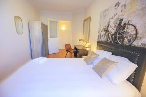 Posteľ alebo postele v izbe v ubytovaní Le 34 Malon, T5 hypercentre chic et cosy, wifi, netflix par SOVALFI