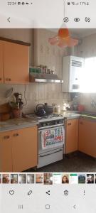 A kitchen or kitchenette at Departamento planta alta chauvin