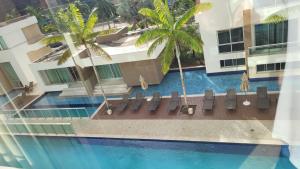 an aerial view of a swimming pool at a hotel at Flat no Jade Blue Tree in Brasília