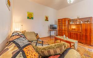 a living room with a couch and a table at Liznjan - Blue Gate Manor in Ližnjan