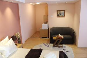 Ein Sitzbereich in der Unterkunft Guest Accommodation Zone