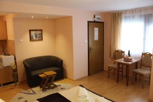 Ein Sitzbereich in der Unterkunft Guest Accommodation Zone