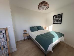 Posteľ alebo postele v izbe v ubytovaní Appartement 3* face plage avec balcon et 2 salles d'eau - FR-1-197-551