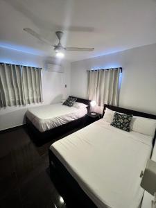 Postel nebo postele na pokoji v ubytování Villa Gonzalez - 3BR House & Pool