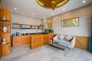Kuchyň nebo kuchyňský kout v ubytování Bon Sand Villa & Spa Hoi An