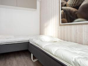 Giường trong phòng chung tại 4 person holiday home in Wendtorf