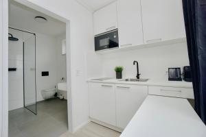 Η κουζίνα ή μικρή κουζίνα στο Motel by Maier Götzis- kontaktloser Check-in