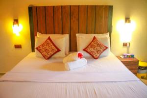 Katil atau katil-katil dalam bilik di Machcha Lodge Sigiriya