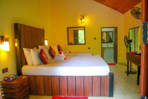 Katil atau katil-katil dalam bilik di Machcha Lodge Sigiriya