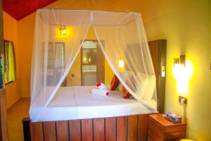 Katil atau katil-katil dalam bilik di Machcha Lodge Sigiriya