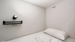 Ein Bett oder Betten in einem Zimmer der Unterkunft Paknap Hostel