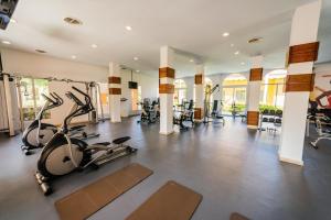 a gym with treadmills and elliptical machines at Luxury Private Villas with Pool, Private Beach, BBQ in Punta Cana
