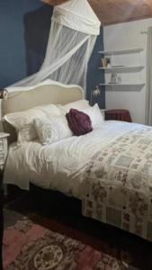 Postel nebo postele na pokoji v ubytování IN DE VINES -Cabernet-Farmstay