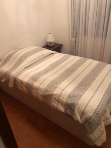 Postel nebo postele na pokoji v ubytování Calafell Residencial