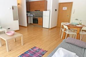 Kuchyň nebo kuchyňský kout v ubytování Apartamentos Canillo 3000