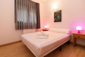 Postel nebo postele na pokoji v ubytování Apartamentos Canillo 3000