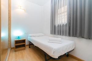 Postel nebo postele na pokoji v ubytování Apartamentos Canillo 3000