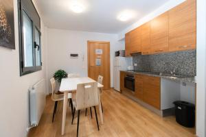 Kuchyň nebo kuchyňský kout v ubytování Apartamentos Canillo 3000