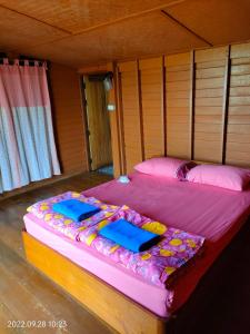 Postel nebo postele na pokoji v ubytování Inpai Resort อินปายรีสอร์ท + 37 fotografií