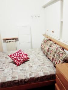 Postel nebo postele na pokoji v ubytování J&C HOUSE -LAKE BOSISIO