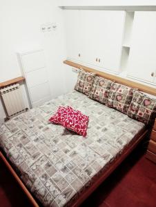 Postel nebo postele na pokoji v ubytování J&C HOUSE -LAKE BOSISIO