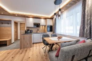 Kuchnia lub aneks kuchenny w obiekcie Apartment NH96 inklusive kostenfreiem Eintritt in die Alpentherme
