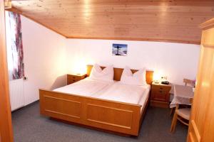 Giường trong phòng chung tại Mitterstererhof