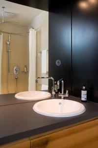 A bathroom at Limmathof Baden - Historisches Haus & Spa