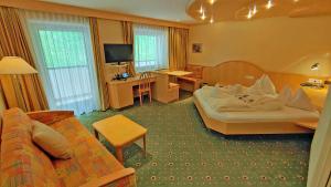 TV a/nebo společenská místnost v ubytování Hotel Zebru