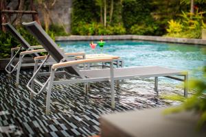 Bazén v ubytování Kudos Parc Pattaya nebo v jeho okolí