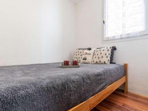 Ліжко або ліжка в номері Appartement Saint-Lary-Soulan, 2 pièces, 4 personnes - FR-1-296-196