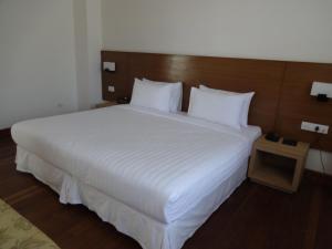 Postel nebo postele na pokoji v ubytování Hotel Osel