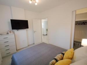 Postel nebo postele na pokoji v ubytování Petra modern apartment with free parking and BBQ