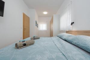 Posteľ alebo postele v izbe v ubytovaní Villa Azeret ZadarVillas