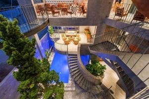 an overhead view of a swimming pool in a building at Tournesol Villa Dalat in Xuan An