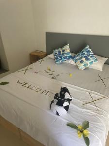 Letto o letti in una camera di Coco Cottage Local Style