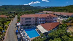 an aerial view of a house with a swimming pool at Kozanos Suites with Private Pool in Amoudi