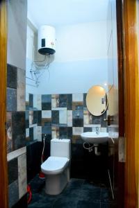 Ванна кімната в Sri Apartment 2BHK For Familys Couples Parking A1