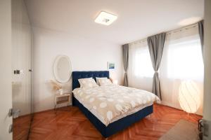 Łóżko lub łóżka w pokoju w obiekcie Casa della Nonna Old town Zadar